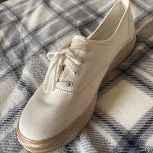 Keds cream and gold platform sneakers